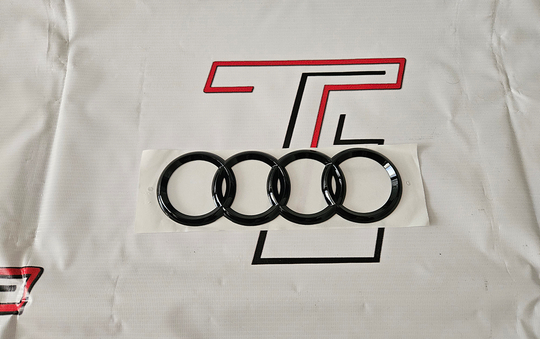 Эмблема Audi
