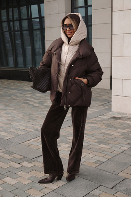 Пуховик средней длины с декором на карманах