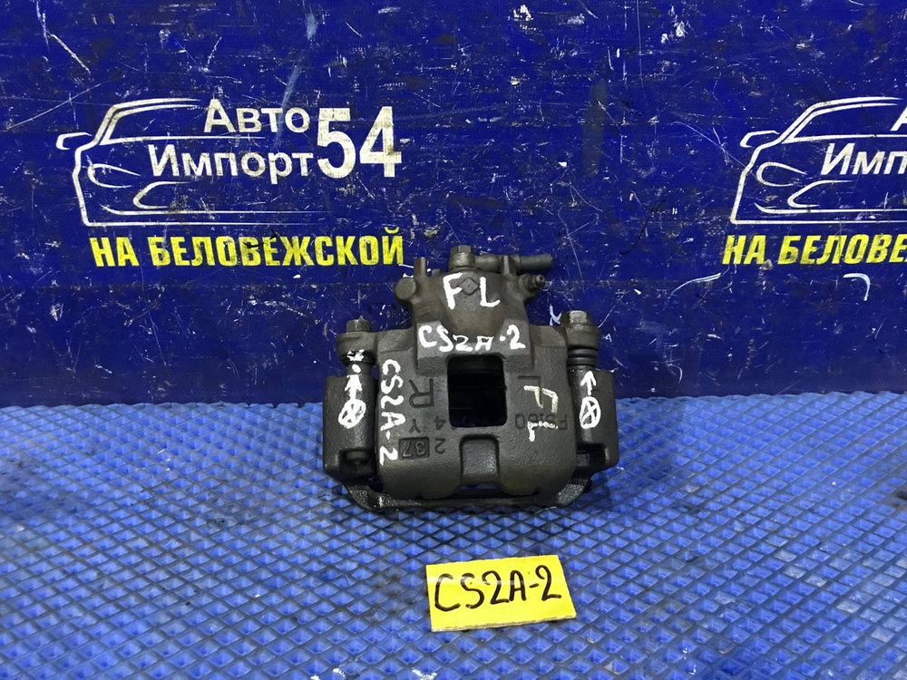 Суппорт тормозной передний левый MITSUBISHI LANCER 2002