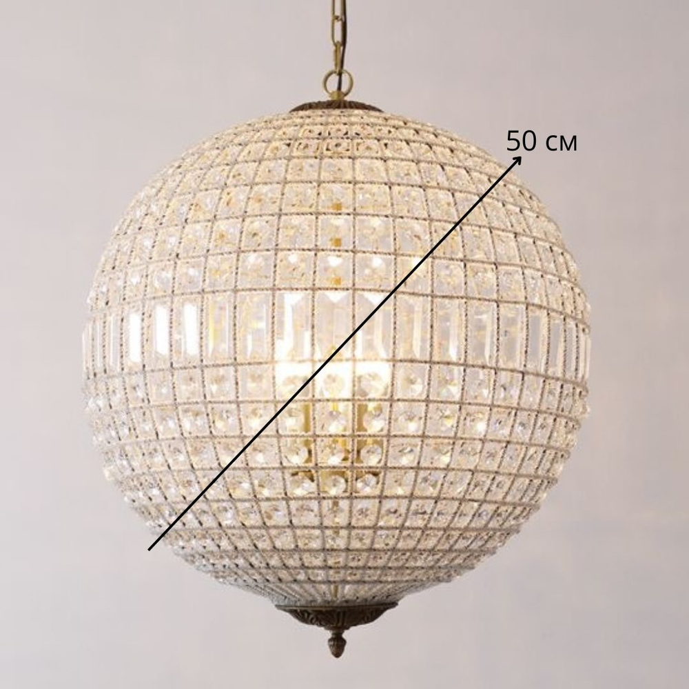Элегантная подвесная люстра с шарообразным плафоном из фактурного стекла