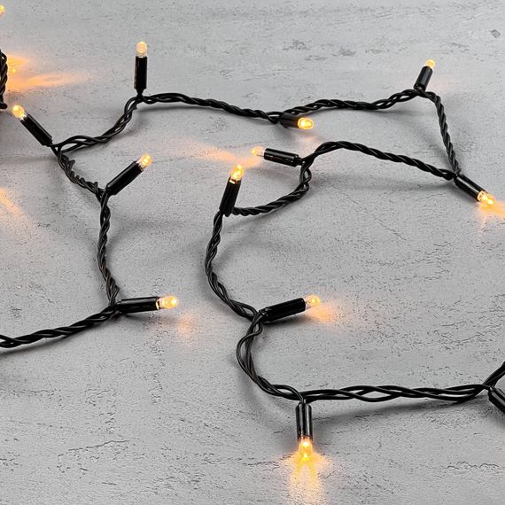 Светодиодная гирлянда с колпачком 100 экстра теплых белых LED ламп 10 м., 24В., черный провод ПВХ, IP65, LTC (PST100CAP-11-1EWW)