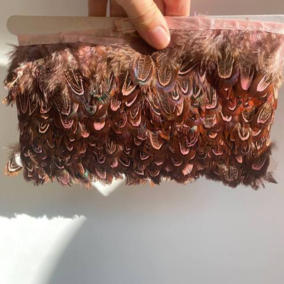 Перья фазана на ленте розового (перьевая тесьма) 4-6 см.