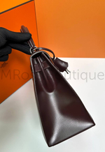 Женская сумка Hermes Kelly коричневого цвета