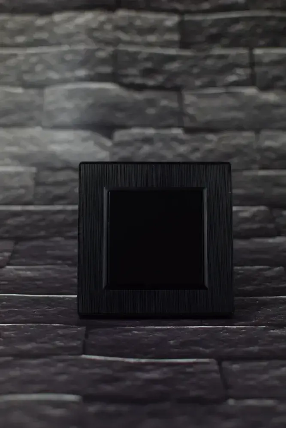 Выключатель одноклавишный черный