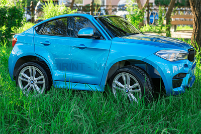 Детский двухместный электромобиль "BMW X6M" JJ2199 12V