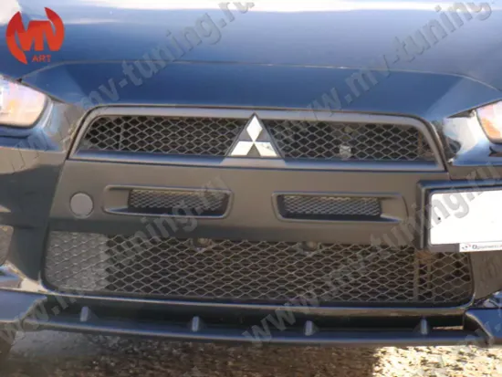 Зубатка между передними клыками для Mitsubishi Lancer 10