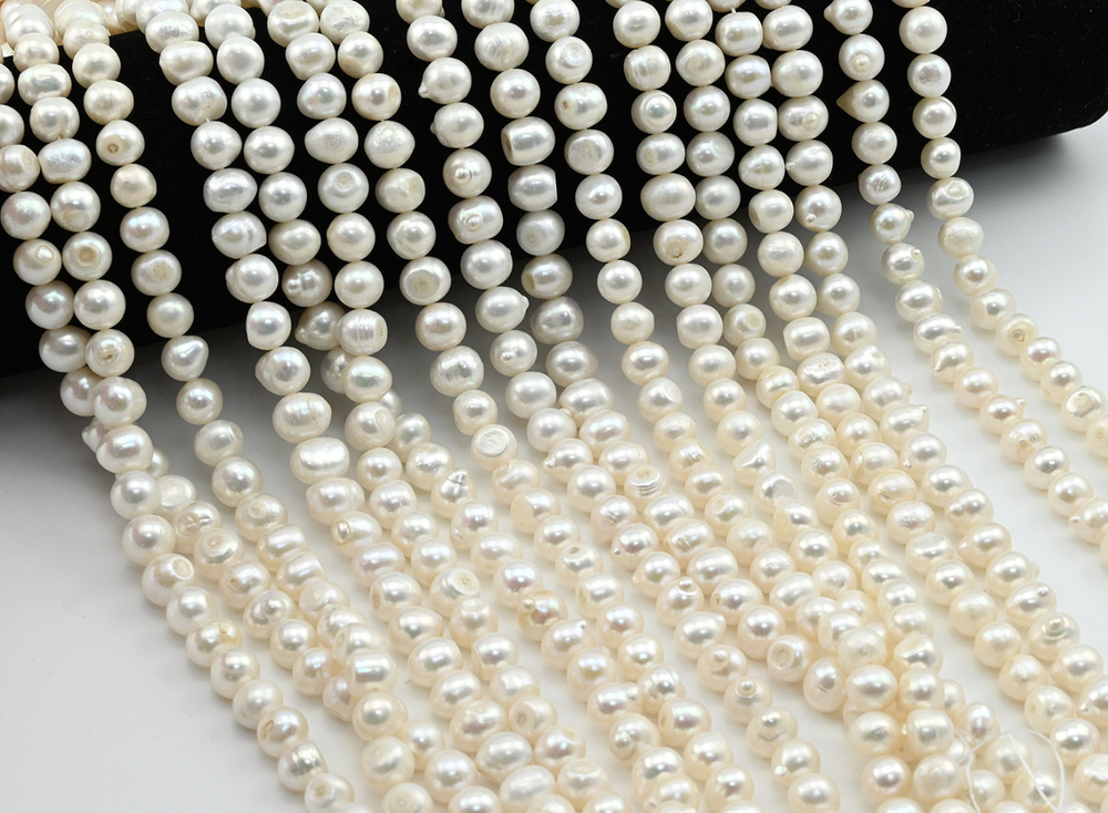 18506 Жемчуг "Овал" 8*6мм, нить 34см