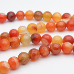 Агат тонированный ярко-оранжевый бусины, размер 8,1-8,3 мм, цена за 22-23 шт (1/2 нити)