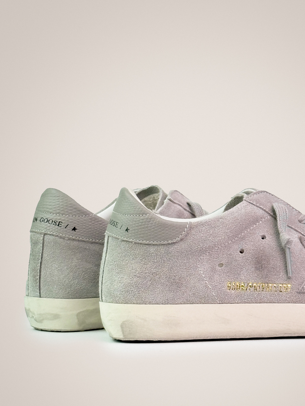 Super Star in grey suede with lizard print inserts