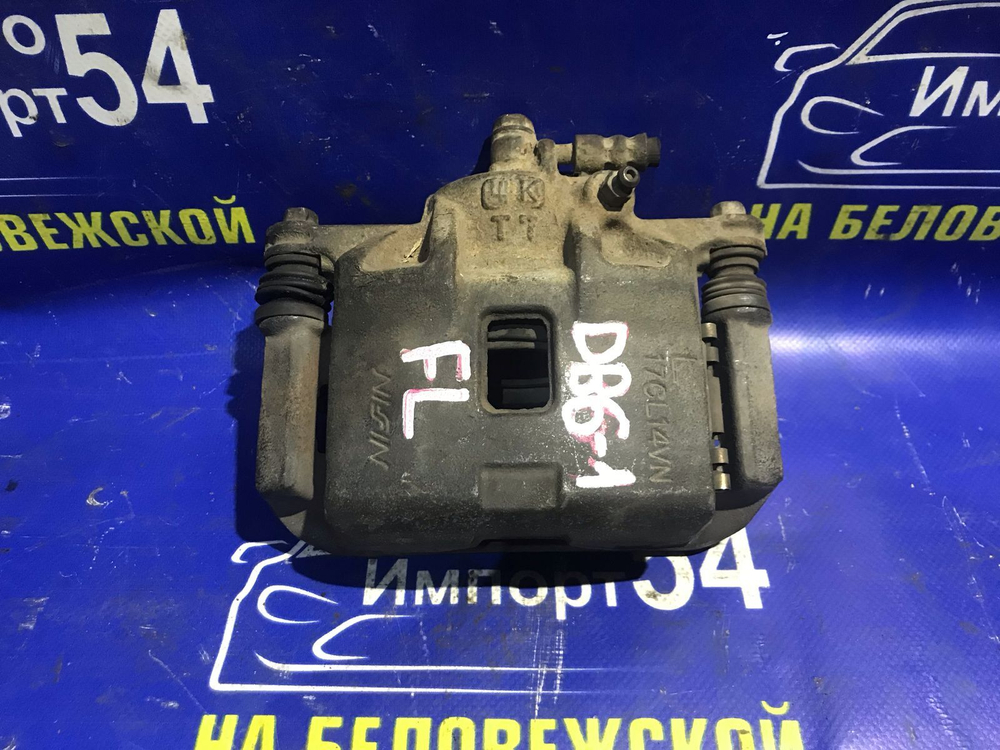 Суппорт тормозной передний левый Honda INTEGRA 1995