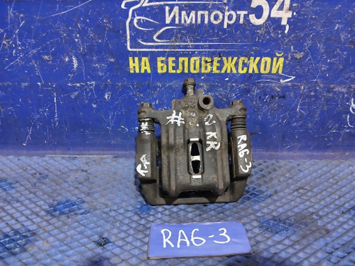 Суппорт тормозной задний левый Honda ODYSSEY 2001