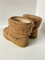 Новые меховые сапоги Donsje, 31