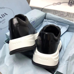 Кроссовки Prada