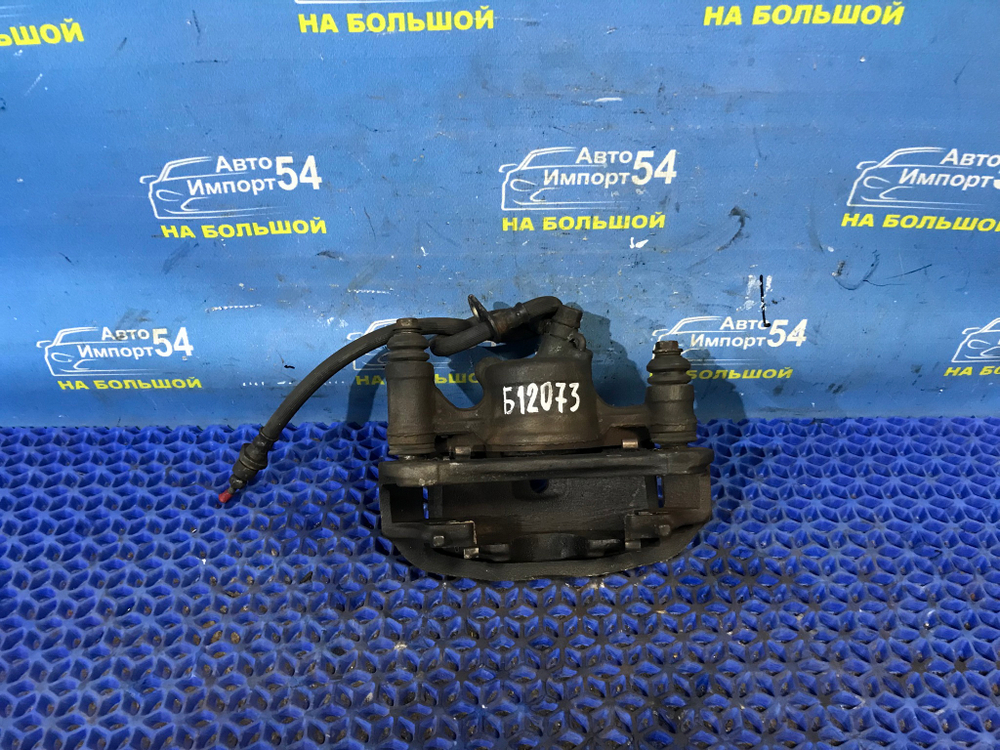 Суппорт тормозной передний левый TOYOTA RAUM 1997-2003