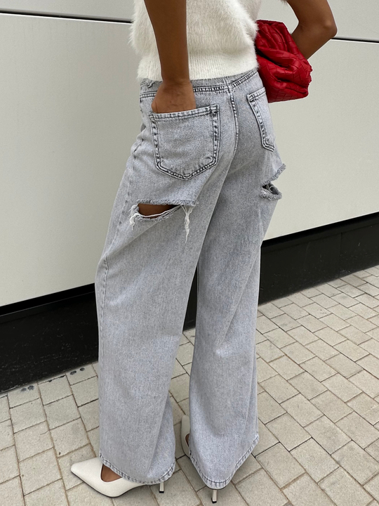 Джинсы палаццо с прорезями сзади