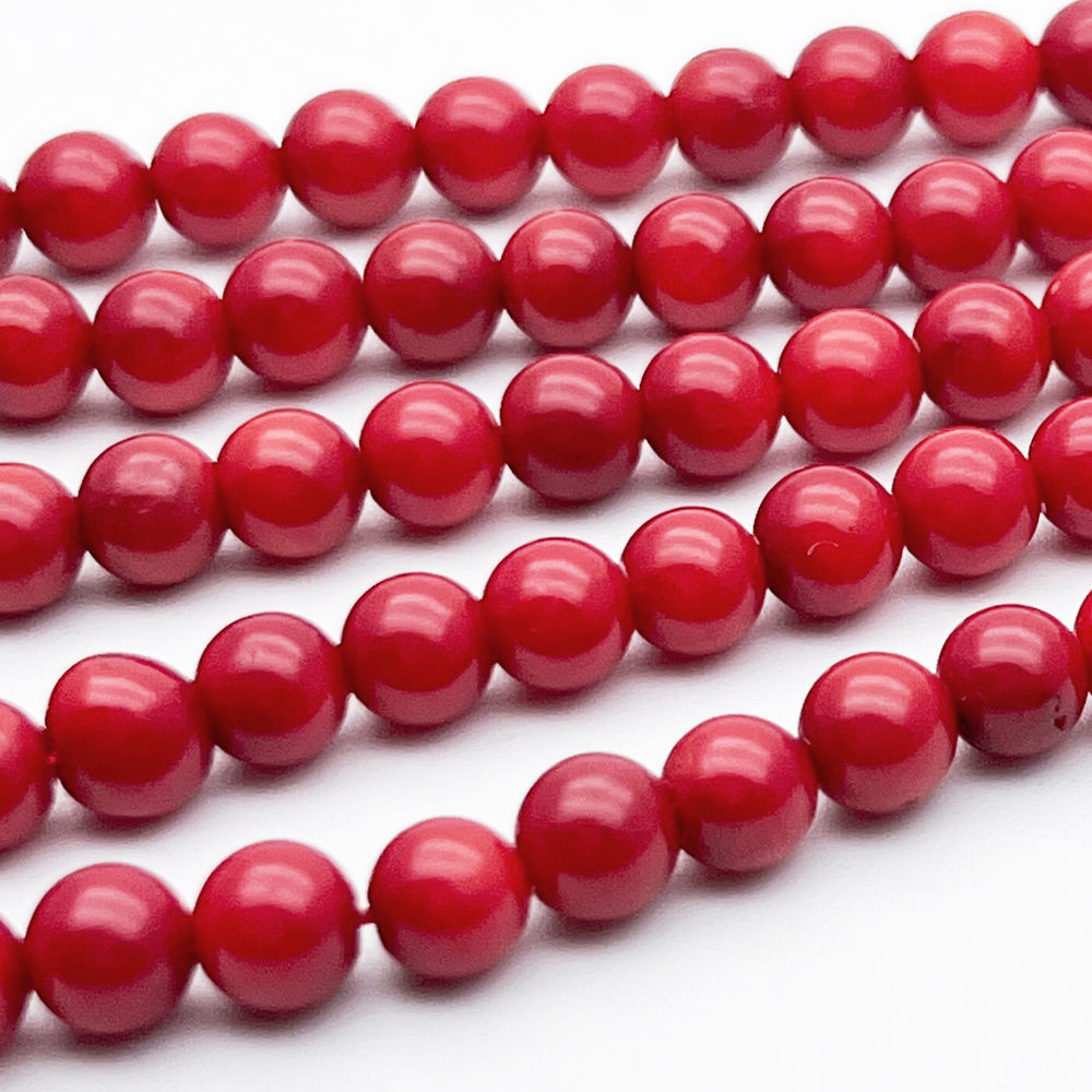 Коралл тонированный бусины, диаметр около 5,4-5,6 мм, цена за отрезок 19 см (1/2 нити)