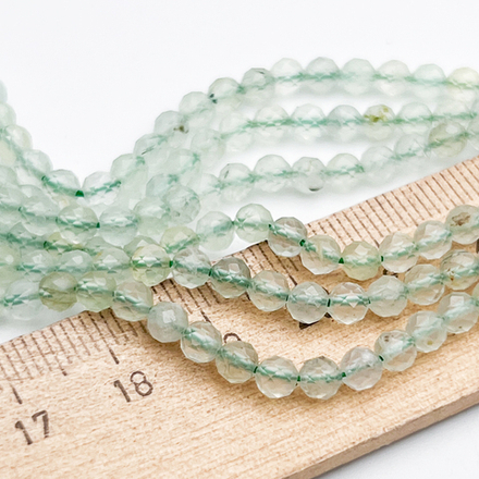 Пренит граненый бусины, диаметр около 4 мм, цена за отрезок 19 см (1/2 нити)