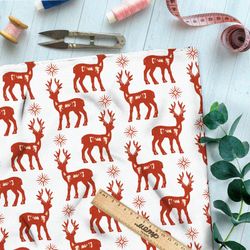 Ткань оксфорд 210 красные олени и звёзды на белом фоне