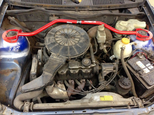 Распорка передних стоек (регулируемая) Opel Kadett E, Pontiac Lemans (с круглым фильтром)