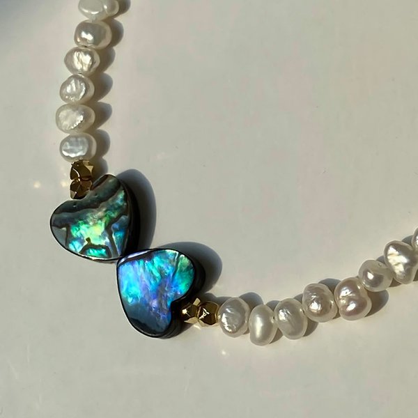 Барочная культивированная жемчужина, розово-персиковая с радужными переливами