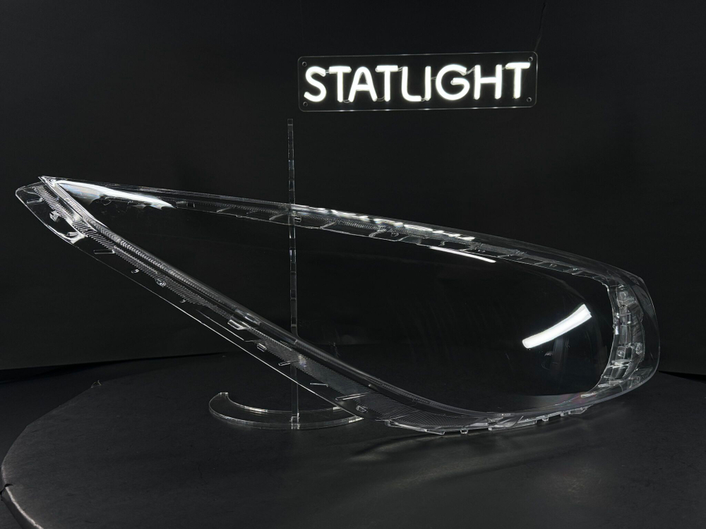 Правое стекло фары Hyundai Tucson 2 IX35 2009-2015