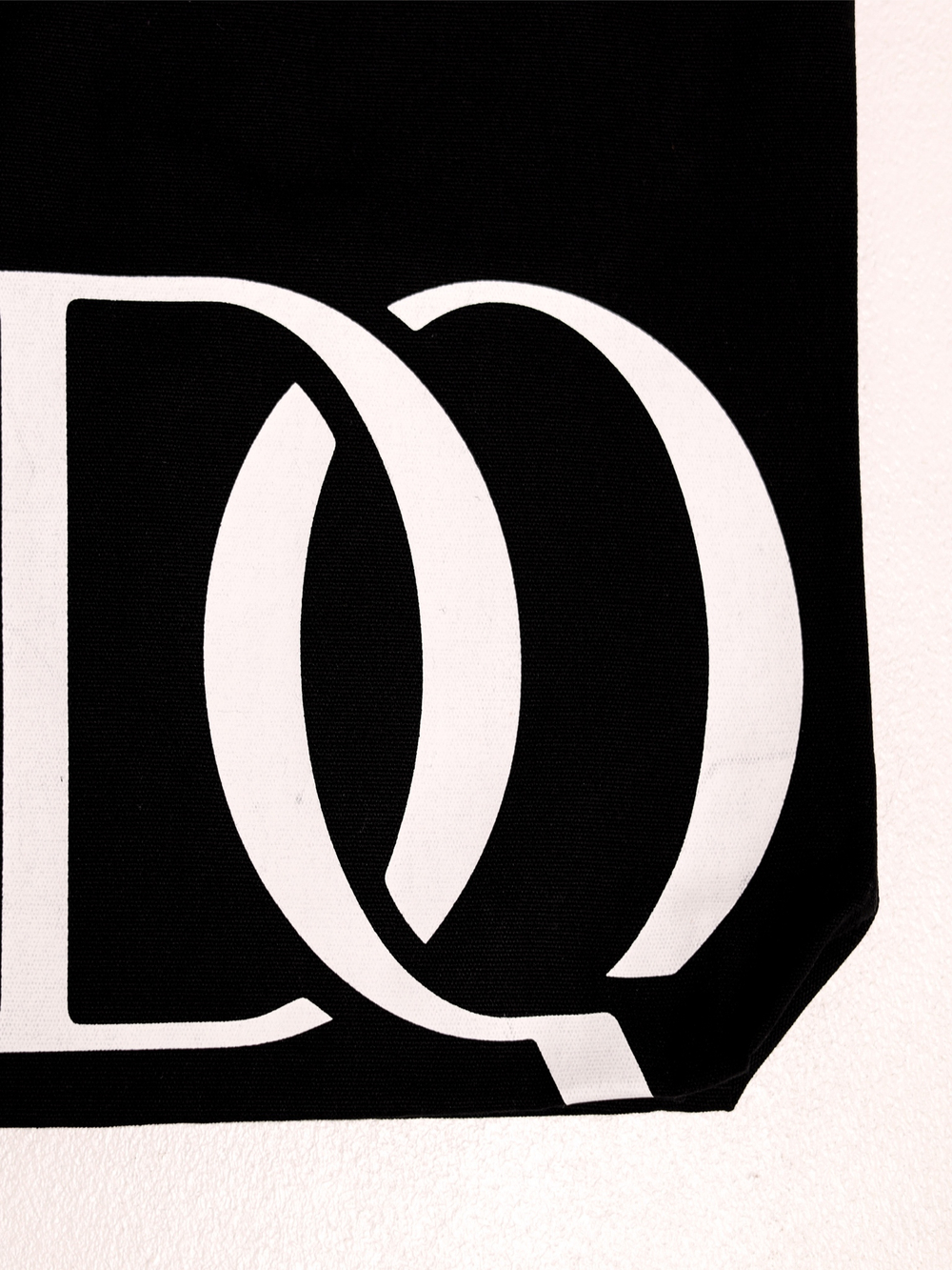 Shopper with "Stranger" logo