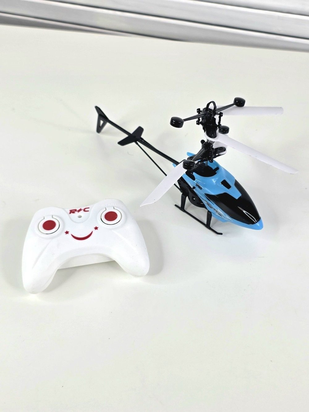 Игрушка Вертолет на радиоуправлении голубой (202388896-1)