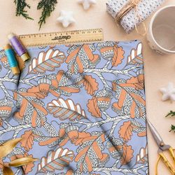 Ткань таффета резной оранжевый дуб с жёлудями на голубом фоне