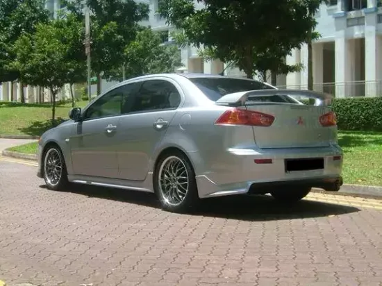Юбка заднего бампера var.1 Zodiak для Mitsubishi Lancer 10