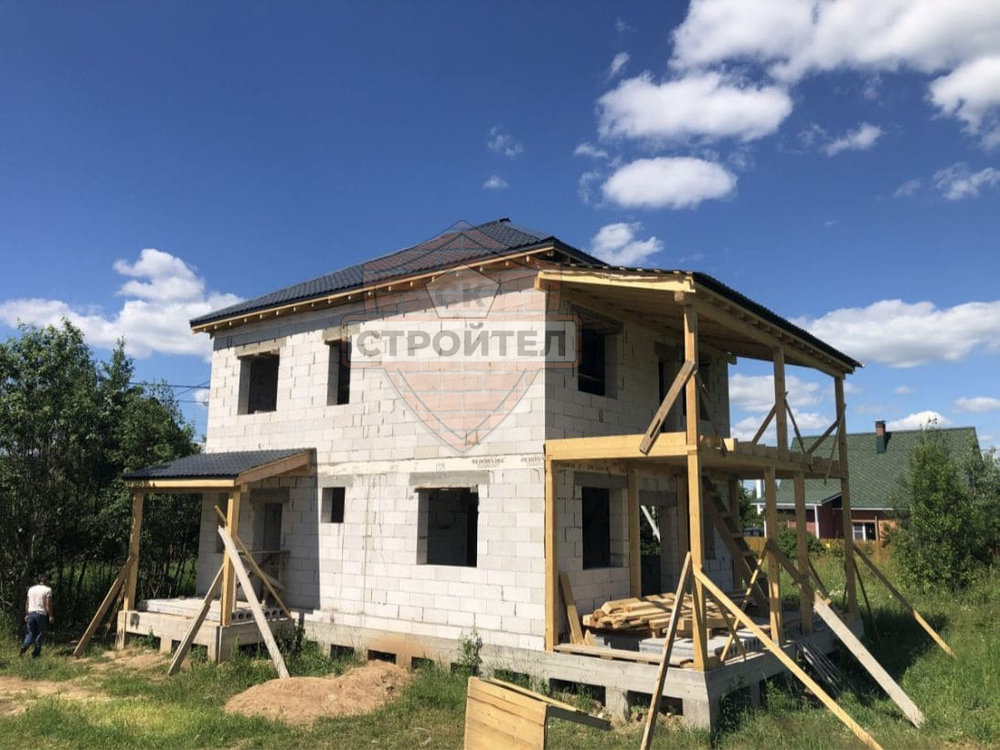 Строительство двухэтажного дома из блоков 210 м2