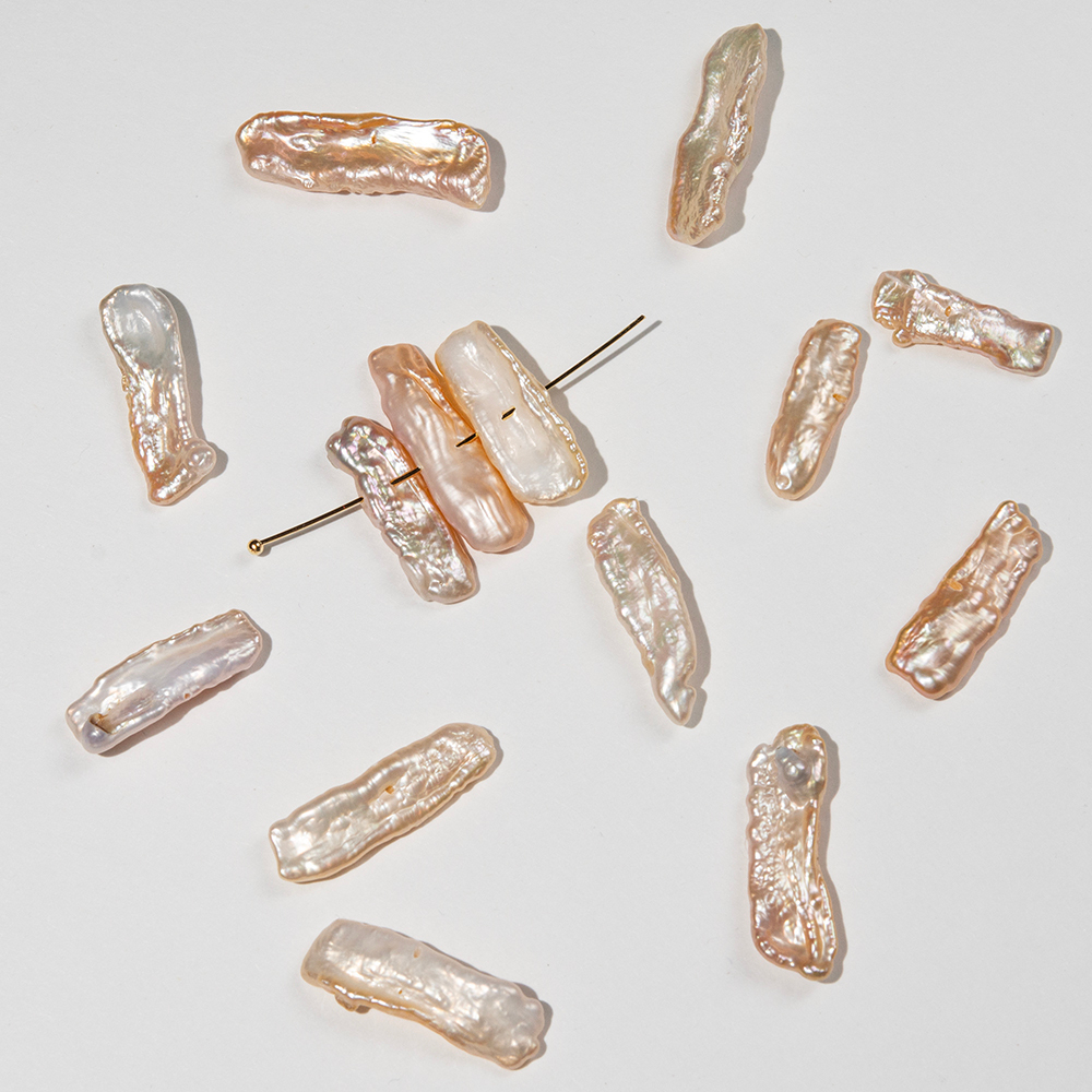 Жемчуг культивированный Бива, розово-персиковый, с боковым центральным отверстием, 18-30*6-9мм