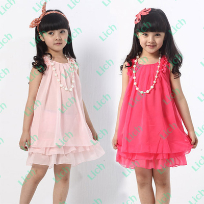 Платье с многослойным подолом и атласным бантом на спине