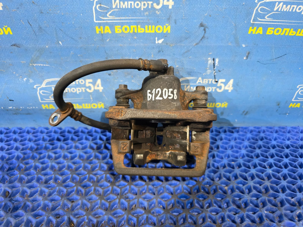 Суппорт тормозной задний правый Honda STREAM 2000-2006