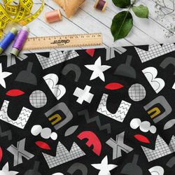 Ткань флис геометричные контрастные символы на чёрном фоне