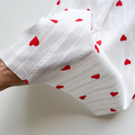 Фактурный хлопок Крупные сердечки на молочном фоне