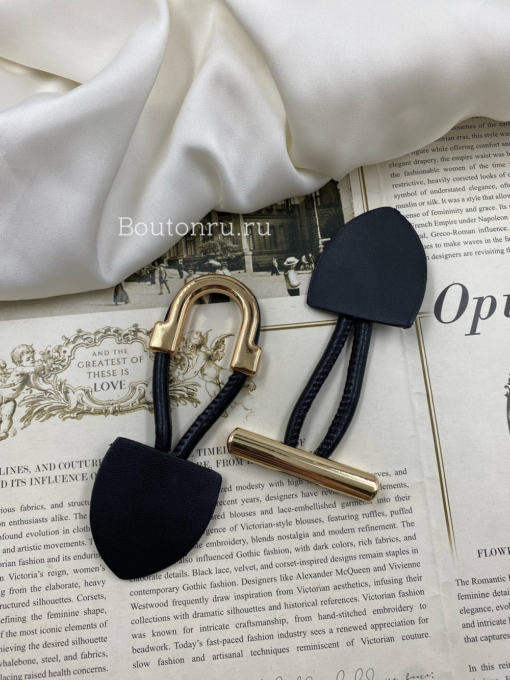 Застежка клевант черная с золотистыми металлическими элементами