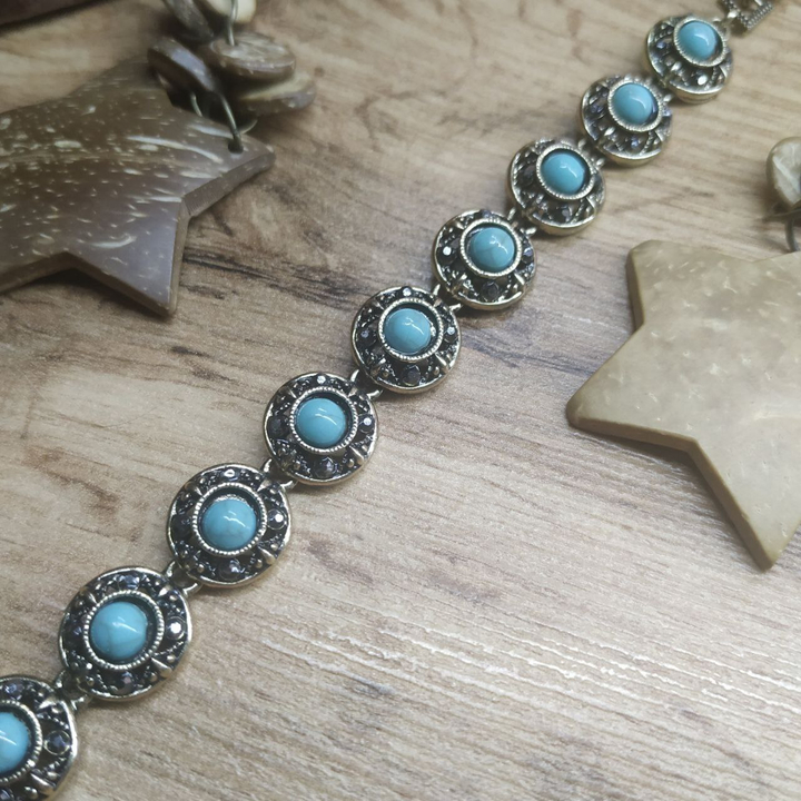 Браслет Vogue Круг бусина под бирюзу стразы графитовые металл золотистый на красном бархате