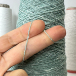 KAYAN - New Mill; 50% меринос, 30% шелк, 10% кашемир, 10% хлопок; 600м/100гр; цвет: зеленый в белую крапинку