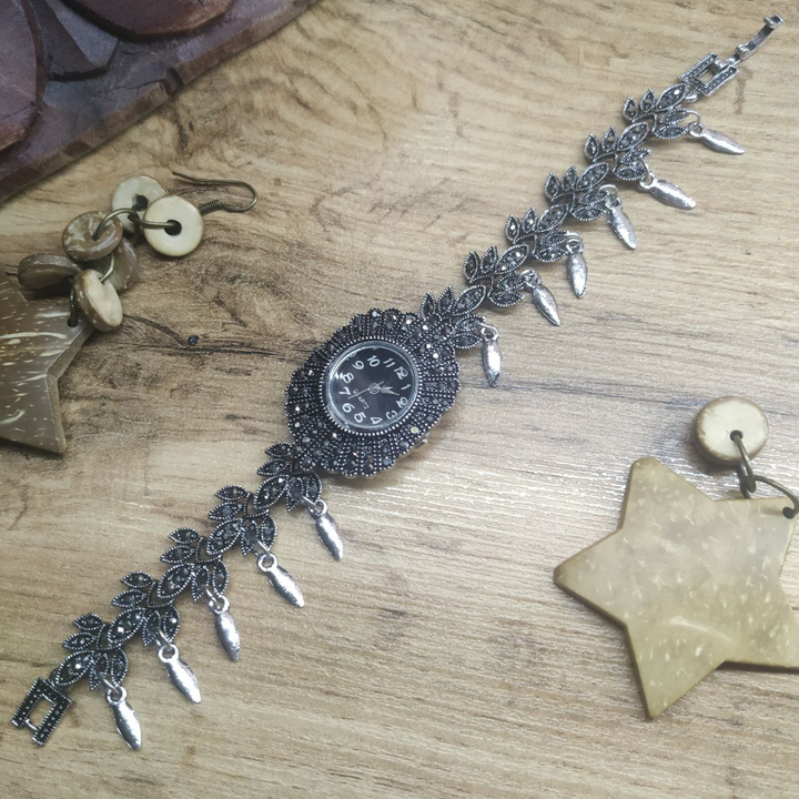 Часы Vogue Лотос циферблат черный в овале стразы графитовые металл серебристый