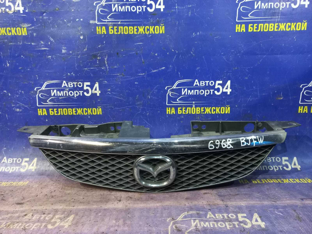 Решетка радиатора MAZDA FAMILIA 2000-2004