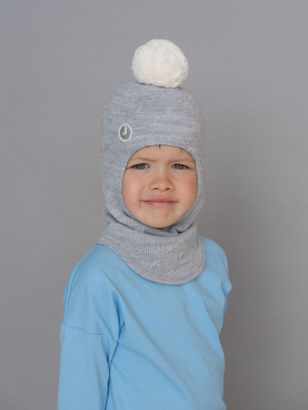 Шлем весенний/осенний вязаный (Св.серый) с мех.помпоном ЧУ