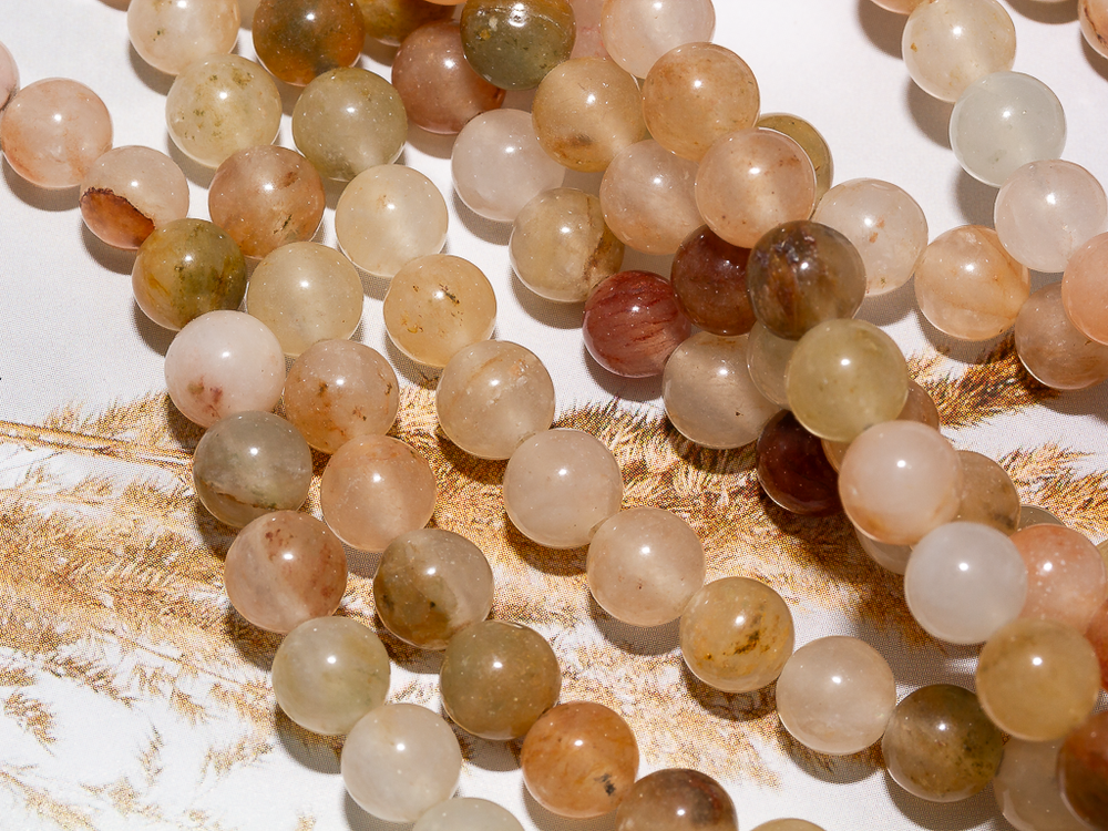 Нить бусин из тонированного кварца 6,5мм