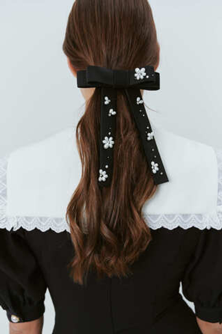 Шелковый бант с жемчужным декором