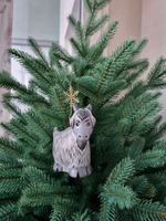 Фарфоровая игрушка козочка серая