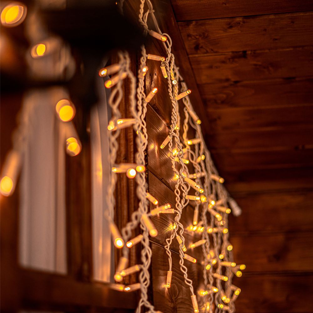 ULD-B3010-200-SWK WARM WHITE IP67 Бахрома светодиодная со статическим свечением. 3м. Соединяемая. 200 светодиодов. Теплый белый свет. Провод белый. TM Uniel.