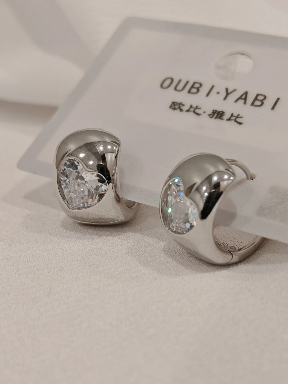 Серьги Oubi Yabi «Сердце в кольце» Silver