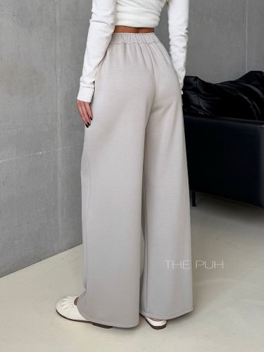 Бежевые женские брюки прямого кроя