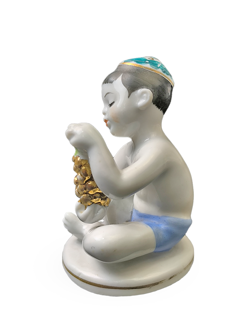 Фарфоровая статуэтка "Мальчик - узбек с виноградом" ЛФЗ