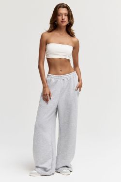 Широкие джоггеры без начеса с лампасом цвета серый меланж