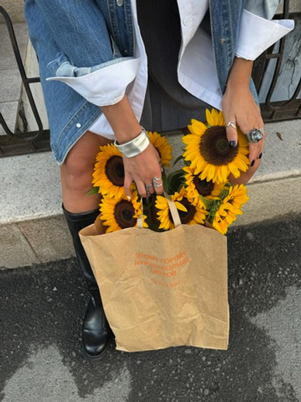 Крафт пакет "Этому городу нужно больше цветов"